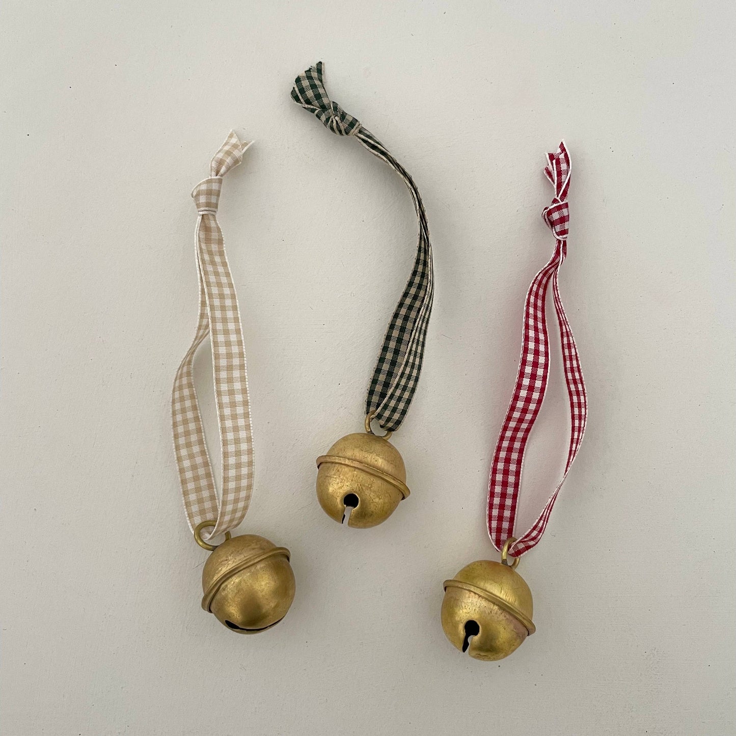 1 1/4" brass sleigh bell ornament on gingham ribbon: Forest Green/Tan