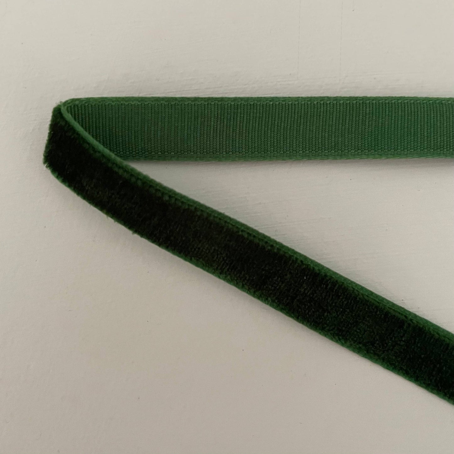 2 1/2" brass flared bell ornament on velvet ribbon: Evergreen